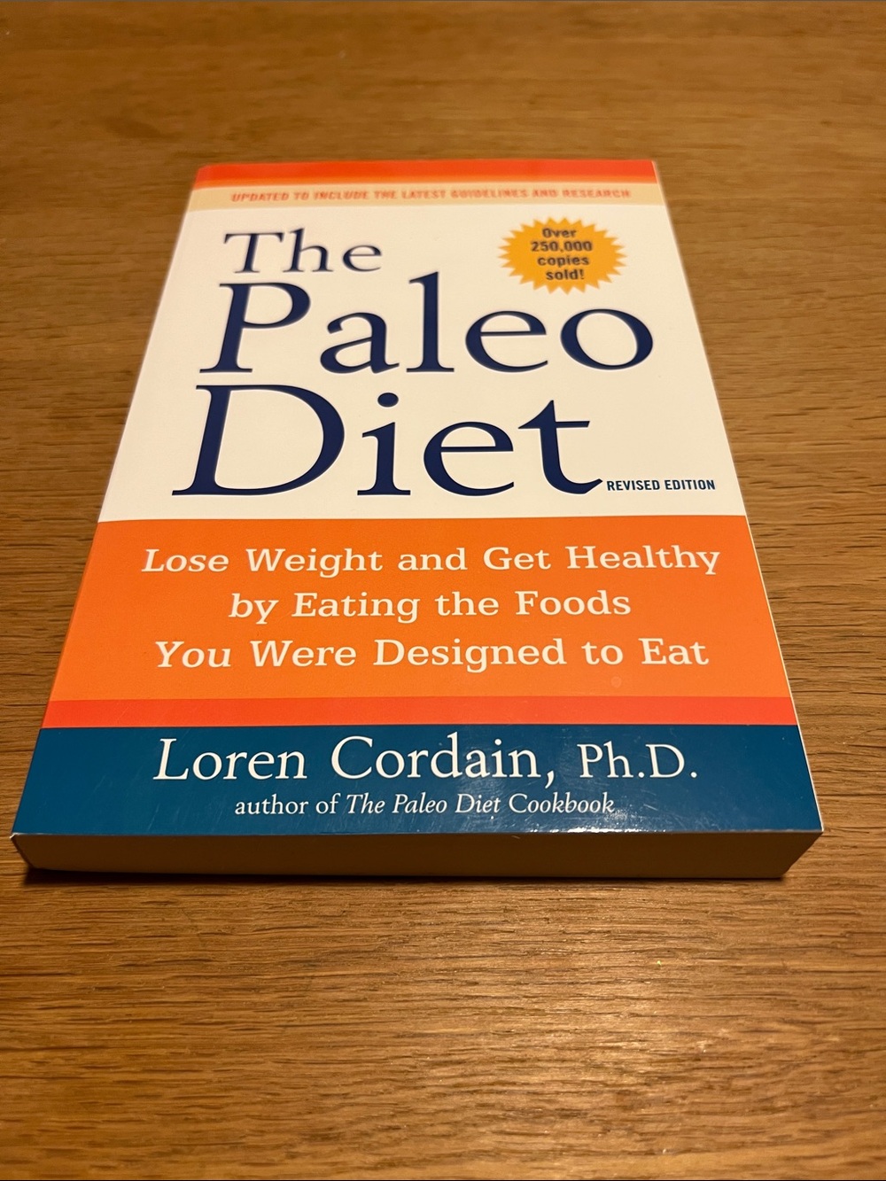 The Paleo Diet by Loren Cordain - White, Orange, Blue Cover
